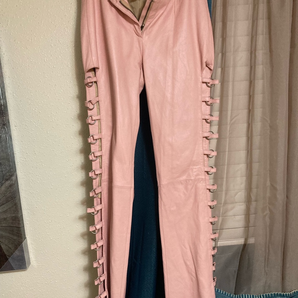 Pink leather strapped pants